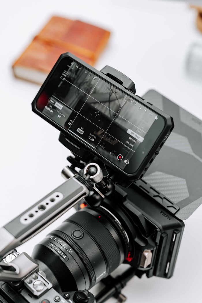 Close-up of a camera rig with an external monitor, perfect for film production.
